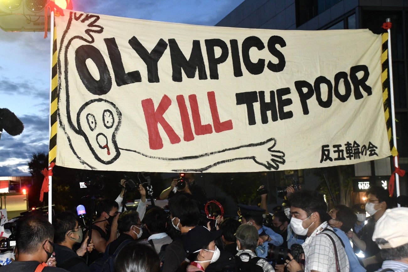 A banner with a message “Olympics Kill the Poor” is seen during a protest outside the Japan National Stadium (a.k.a the Olympic Stadium) before the closing ceremony of the 2020 Summer Olympic Games.