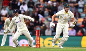 Australia’s Cameron Green (right) goes for a run as England wicketkeeper Sam Billings watches the ball.