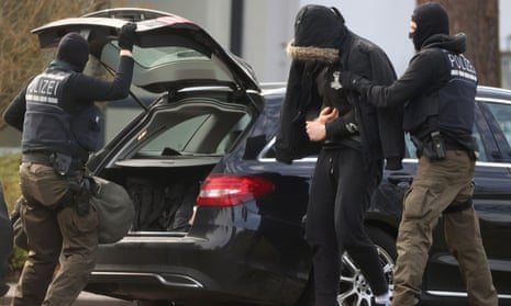 One of the 12 men arrested during police raids across Germany.