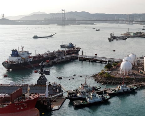 A drone view shows a Chinese-flagged oil tanker moored at an oil terminal at Tsing Yi port, with Tsing Ma bridge in the background, in Hong Kong, China March 19, 2026