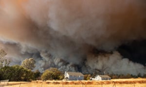 Ahome is overshadowed by towering smoke plumes in Paradise, California . Climate change-related risks will continue to grow without additional action’, the report is set to warn.