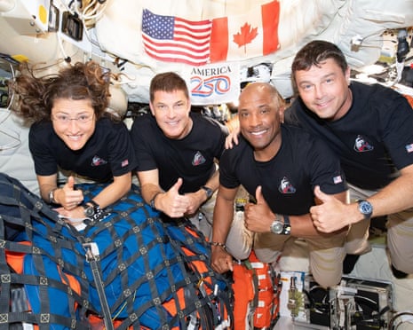 The Artemis II crew – from left, Christina Koch, Jeremy Hansen, Victor Glover and Reid Wiseman – inside the Orion spacecraft on their way home, 8 April 2026.