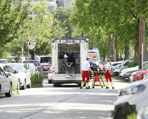 Paramedics close to the school in Graz where several people have died in a shooting. dqxikeidqkikdinv
