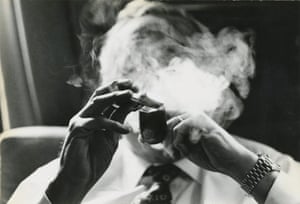 Harold Wilson lighting his pipe, 1977