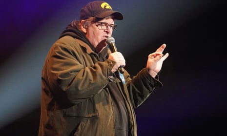 Michael Moore speaks during a rally by Senator Bernie Sanders in Cedar Rapids, Iowa, in February.