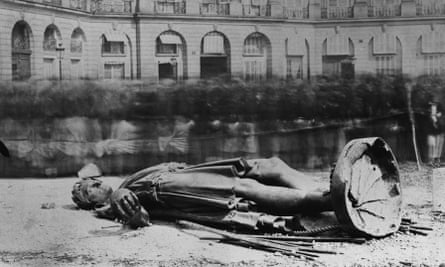 A statue of Napoleon lies broken in the Place Vendome after being dismantled by the Paris Commune.