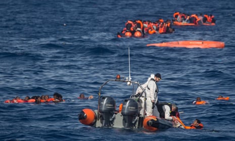A rescue mission off Lampedusa, Italy, after a wooden boat carrying more than 500 people partially capsized, in May 2017