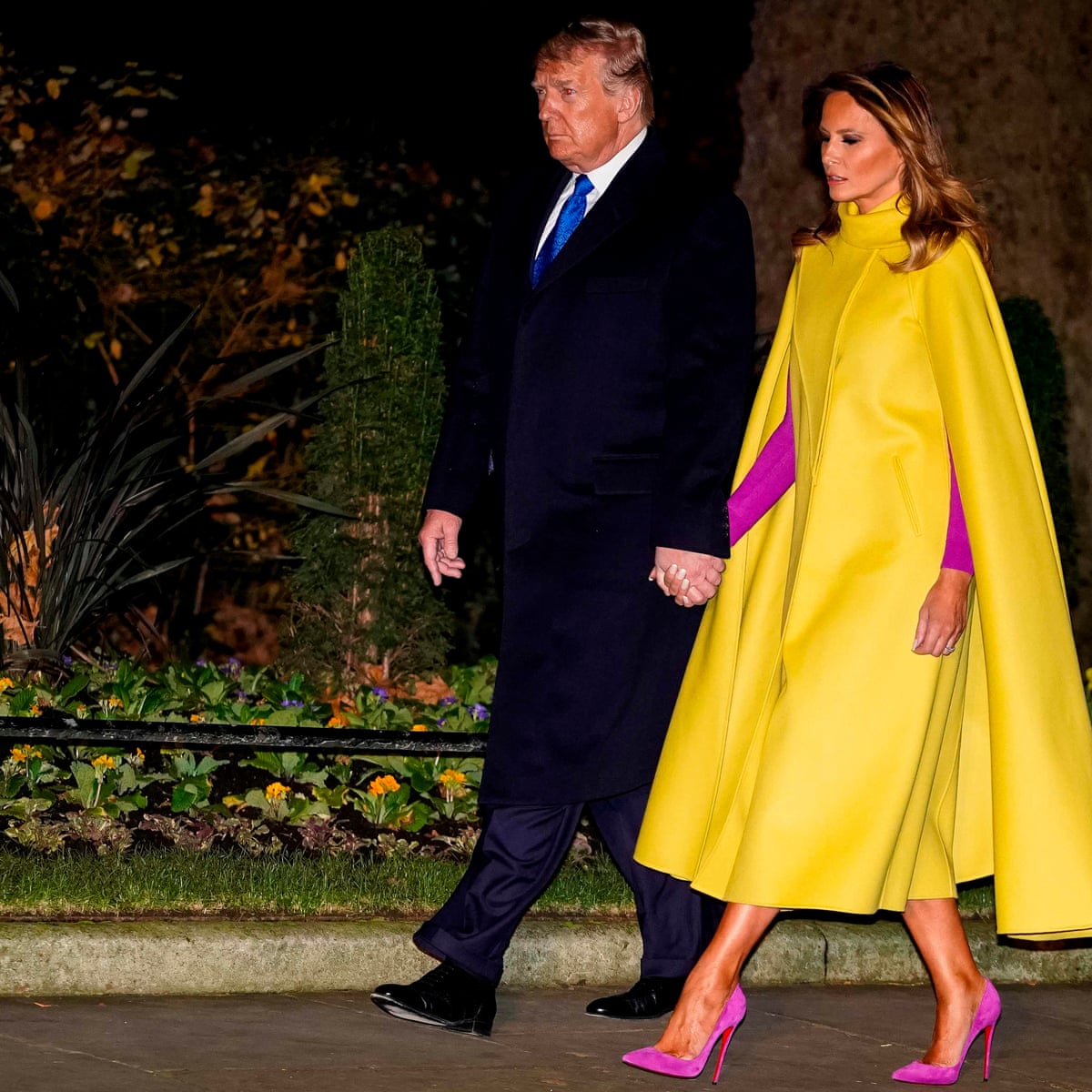 Style superstar or pop culture villain? The meaning of Melania Trump's cape | Fashion | The Guardian Style superstar or pop culture villain? The meaning of Melania Trump's cape | Fashion | The Guardian
