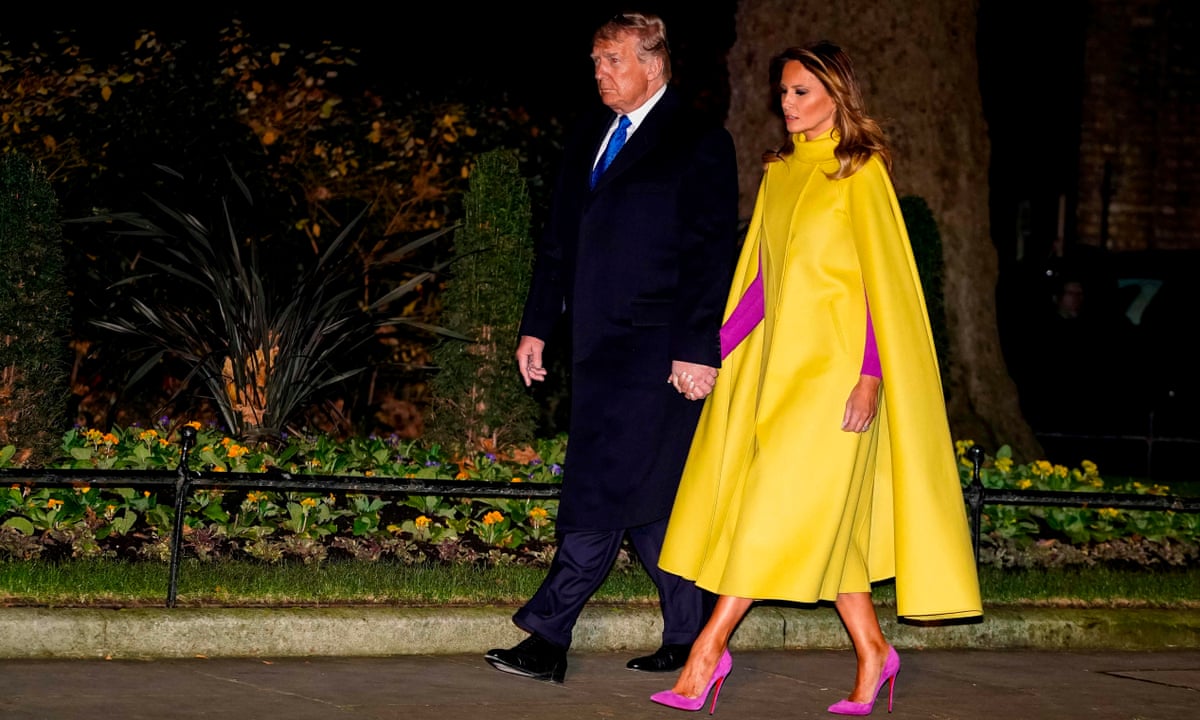 Style superstar or pop culture villain? The meaning of Melania Trump's cape | Fashion | The Guardian Style superstar or pop culture villain? The meaning of Melania Trump's cape | Fashion | The Guardian