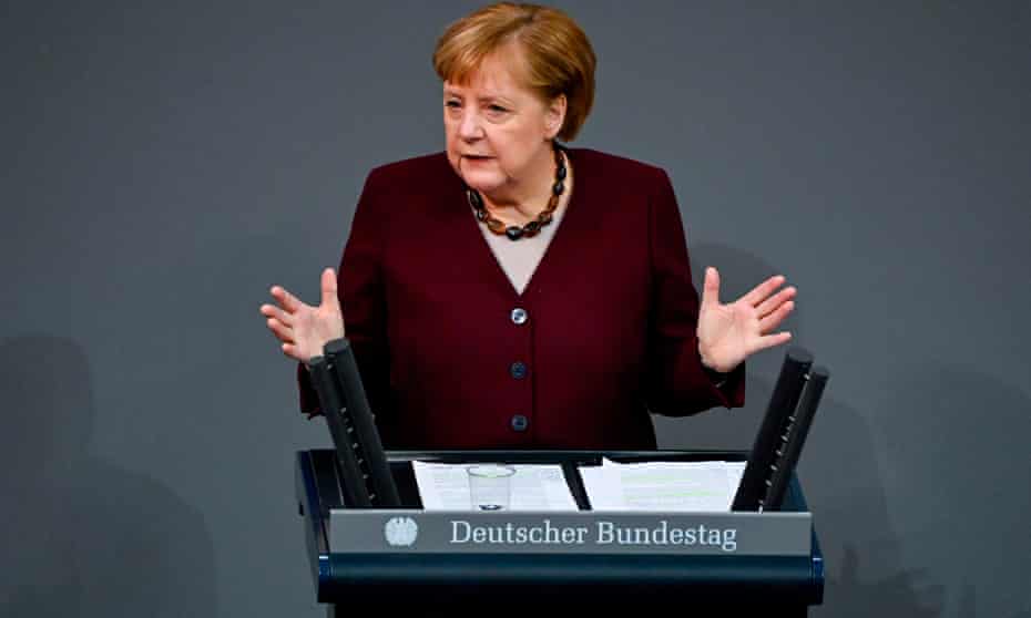 Angela Merkel delivers a speech during a session at the Bundestag.