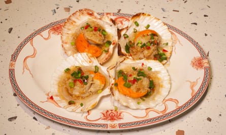 Four scallops in the shell.
