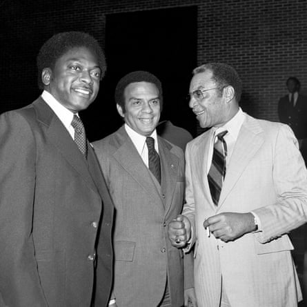 Three men in suits.