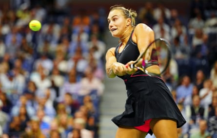 Aryna Sabalenka plays a backhand against Jessica Pegula