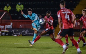 Curtis Jones scores Liverpool’s third goal, the first of his double at Lincoln