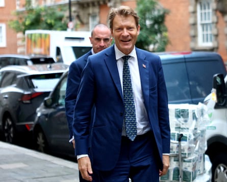 Reform UK's deputy leader, Richard Tice, walking in London