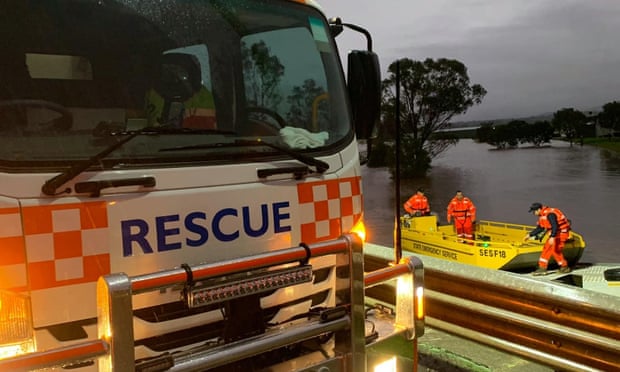 SES crews on a boat at the site of flooding in Port Stephens, NSW