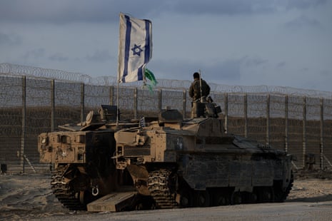 An Israeli military vehicle at the Gaza border fence, 3 June.
