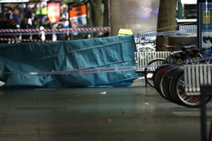 Police tape seen on Bourke St.