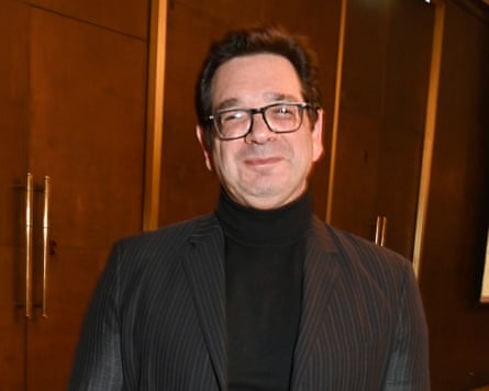 Peter Ettedgui in black polo neck and jacket
