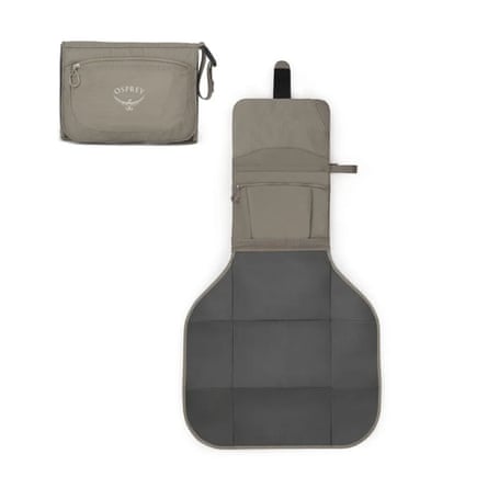 A Osprey Poco Changing Pad rolled out next to its zip up pouch carrier.