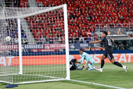 A prone Ezri Konsa heads Aston Villa into the lead.