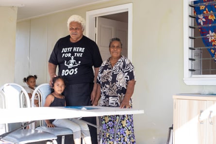 Eleni Via with her husband Ma’uhe’ofa Via and their granddaughter Tu’aloa outside their new home in Masilamea, Tongatapu.