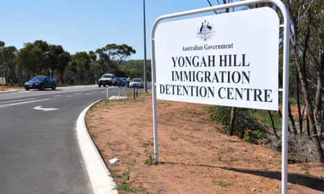 A sign for the Yongah Hill immigration detention centre on the side of a road