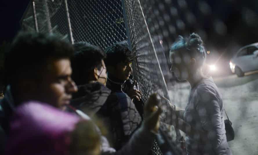 Refugees and migrants in a camp on the Greek island of Lesbos.