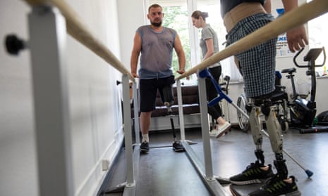 Patients at the clinic learn to walk again using prosthetic limbs.