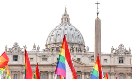Italian Arcigay gay rights association activists hold their flags in Rome during a demonstration in front of the Vatican.