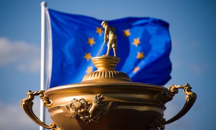 The European Union flag flies behind a statue of the Ryder Cup trophy at Hazeltine in 2016.