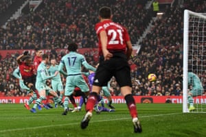 Anthony Martial sweeps in the equaliser from close range.