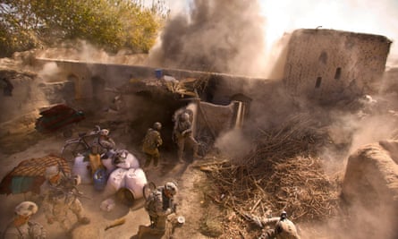 American soldiers of the 101st Airborne blow up a compound suspected of containing IEDs in a village in Panjwai district in 2010.