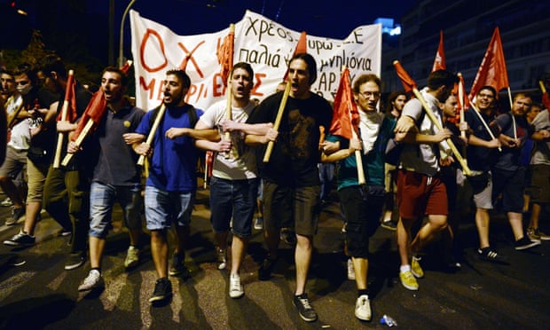 Protesters march on the Greek parliament in Athens during an anti-austerity protest.