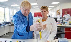 Britain’s Prime Minister Boris Johnson visits the Mologic Laboratory in the Bedford technology Park