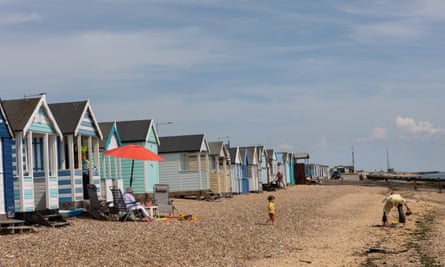 Pastel coloured beach huts line the Thorpe Esplanade east of Southend