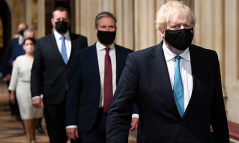 Boris Johnson walks through the Central Lobby from the House of Lords before the Queen’s speech in parliament on Tuesday.