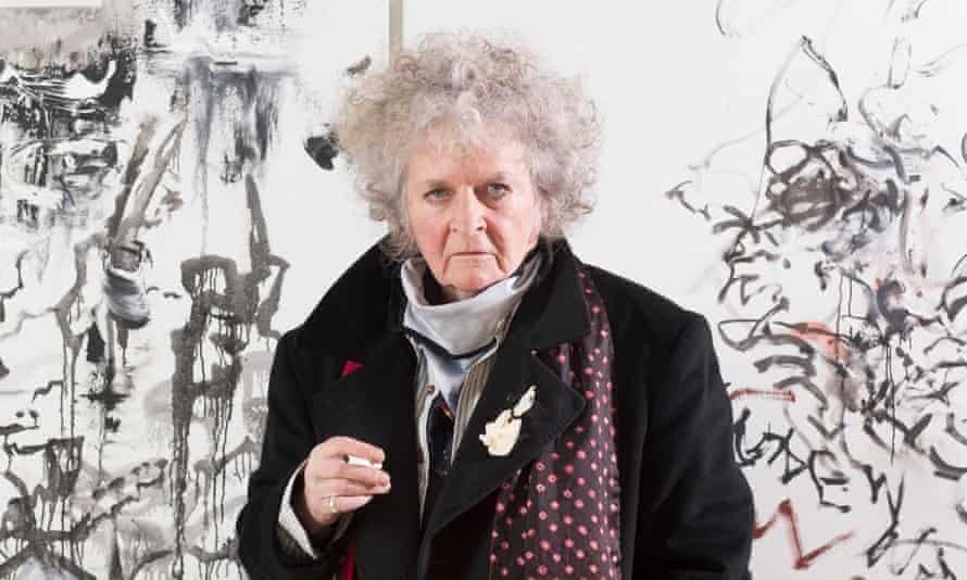 The artist Maggi Hambling in front of a large canvas.