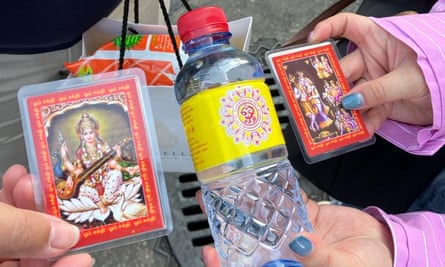 Sacred holy water and cards from Sri Maha Mariamman temple in Bangkok.
