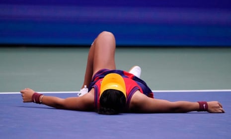 Emma Raducanu drops to the floor after winning the US Open.