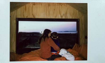 A Polaroid shot of the author and her son watching the views from Luna’s picture window.