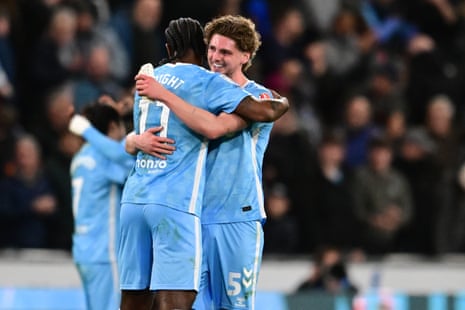 Coventry’s double goalscorer Jack Rudoni (right) celebrates victory with teammate Haji Wright after the final whistle.