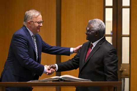 Australian prime minister Anthony Albanese (left) and Solomon Islands prime minister Manasseh Sogavare shake hands ahead at Parliament House in Canberra on Thursday.