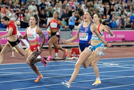 Britain’s Amy Hunt reacts after crossing the finish line to win gold.