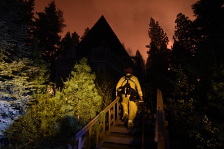 Fire crews battle the Caldor fire on Monday in California.