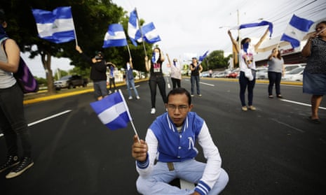 Protesters block a road in Managua, Nicaragua