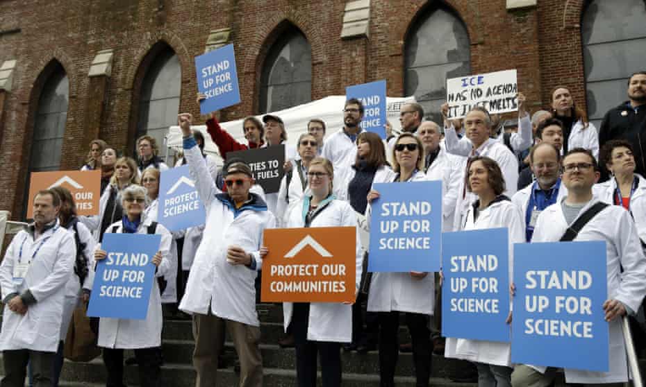 Scientists hold signs during a rally in conjunction with the American Geophysical Union’s fall meeting Tuesday, Dec. 13, 2016, in San Francisco. The rally was to call attention to what scientist believe is unwarranted attacks by the incoming Trump administration against scientists advocating for the issue of climate change and its impacts.