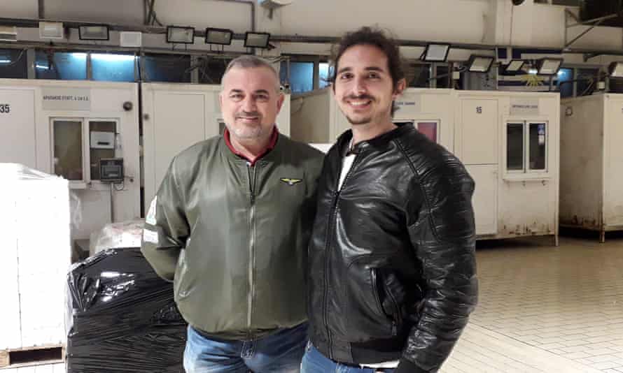 Lefteris Arabakis with his father Vangelis at the fish market in Keratsini.