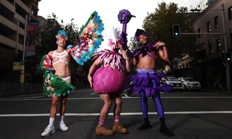Ben Woodlock, Jes Shields and Jamarr Mills of Emerald City Kickball pose on Oxford Street ahead of Saturday night’s parade