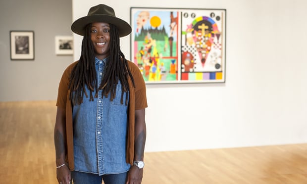 Artist Nina Chanel Abney poses with her work First and Last
